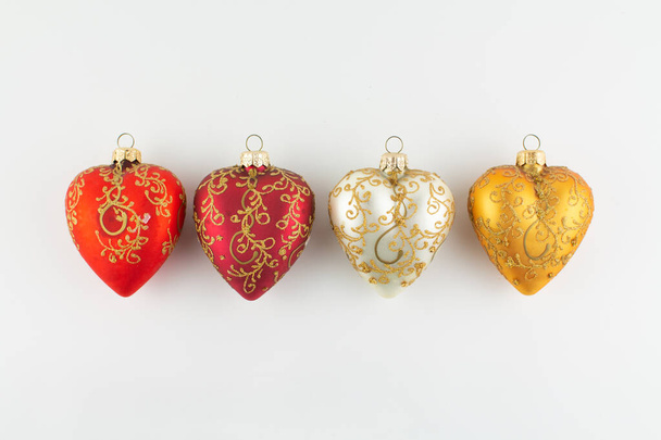 a set of toy hearts for the Christmas tree on the background - Fotoğraf, Görsel