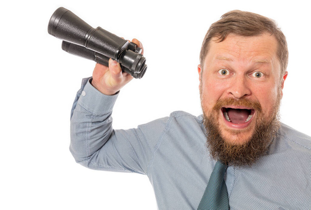 Soilid bearded man in shirt with binoculars - Φωτογραφία, εικόνα