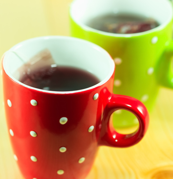 Чашки чая с чайными пакетиками
 - Фото, изображение