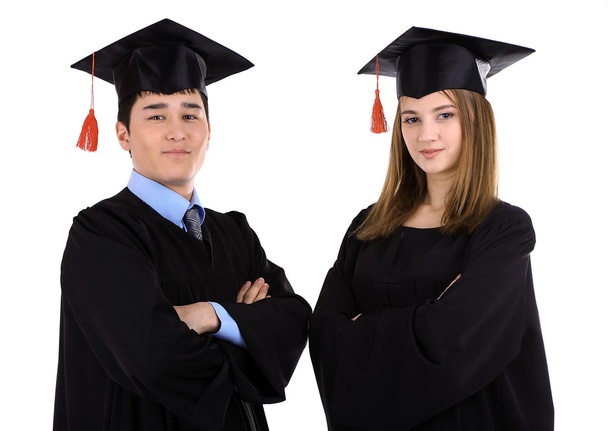 Two happy graduating students isolated on white - Foto, afbeelding