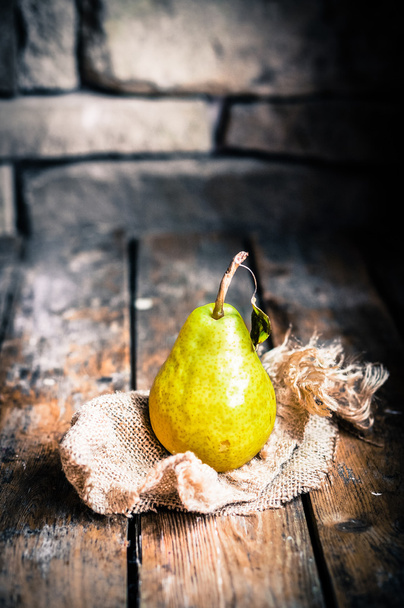Pears on rustic wooden background - Φωτογραφία, εικόνα