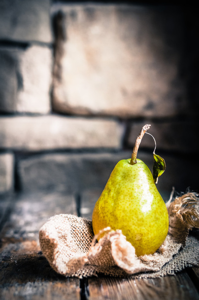 Pears on rustic wooden background - Valokuva, kuva