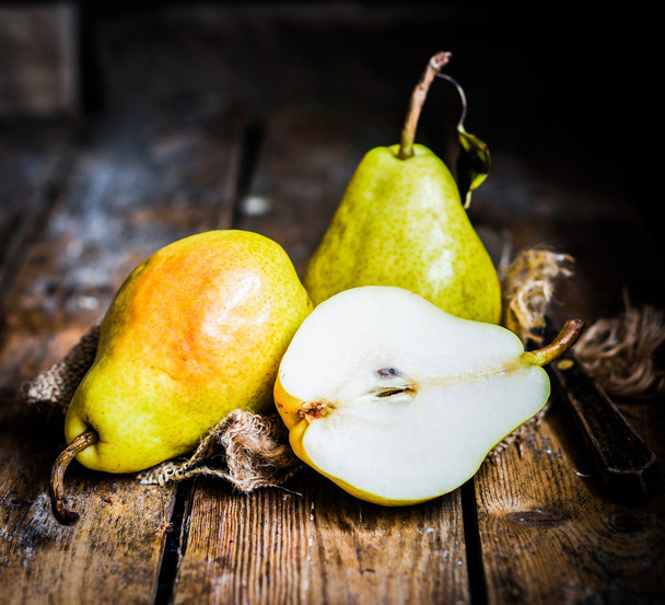 Pears on rustic wooden background - Photo, Image