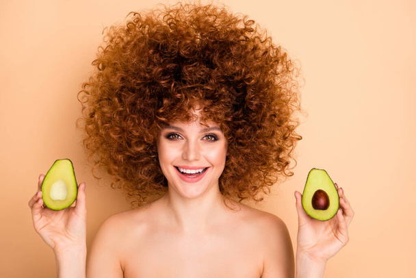 Close up photo beautiful foxy she her wear no clothes nude lady showing present product based on avocado salon stylist curls perms roller curlers tint cool result isolated beige pastel background - Photo, image