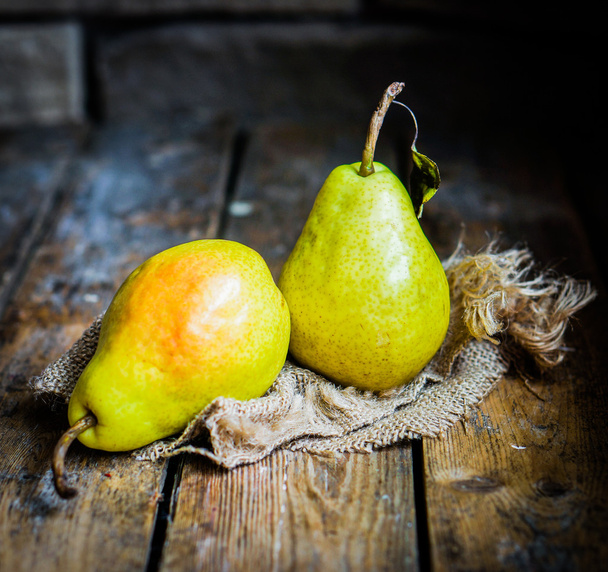 Pears on rustic wooden background - Foto, Imagem