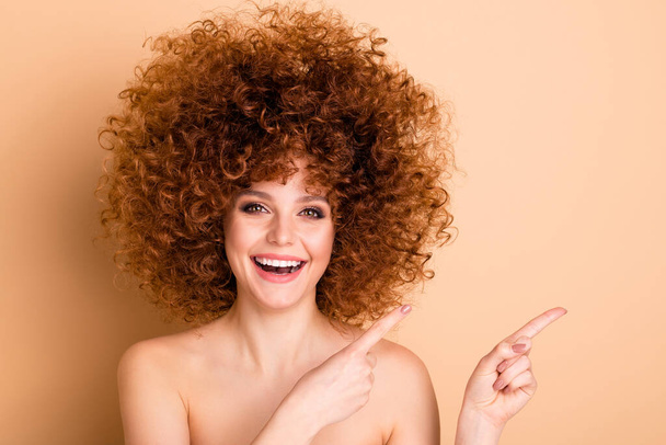 Close up photo beautiful she her wear no clothes nude excited lady curls fashion procedure stylist perms roller curlers salon empty space direct finger show sale discount isolated beige background - Fotoğraf, Görsel