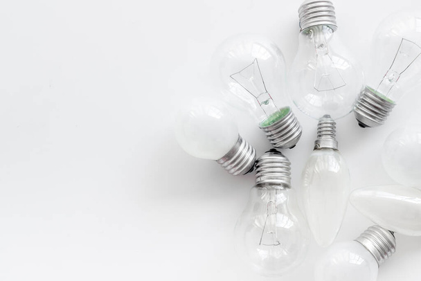 A lot of light bulbs top view. Renewable eco energy concept - Photo, Image