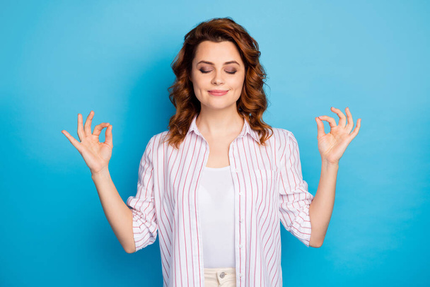 Portrait of her she nice attractive lovely cute cheerful serene wavy-haired girl meditating isolated on bright vivid shine vibrant blue color background - Foto, Imagen
