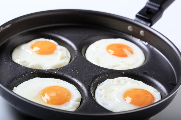 Cuatro huevos fritos
 - Foto, imagen