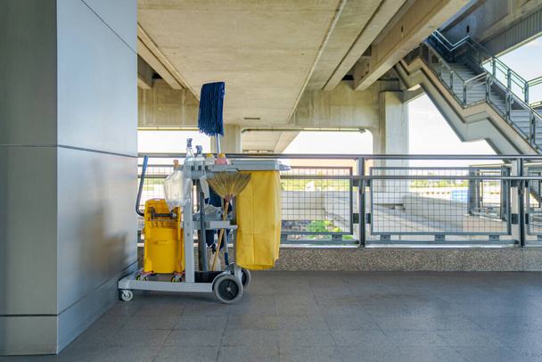 Professional Cleaning Trolley equipment is parked at the outdoor field and ready for everyday use. - Photo, Image