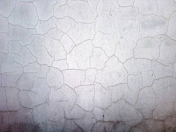 Texture d'un mur blanc fissuré. Mur blanc vieux shabby. - Photo, image