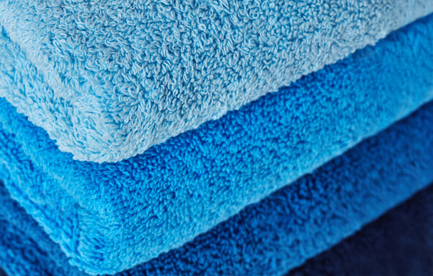 Folded stack of towels close-up - Foto, afbeelding