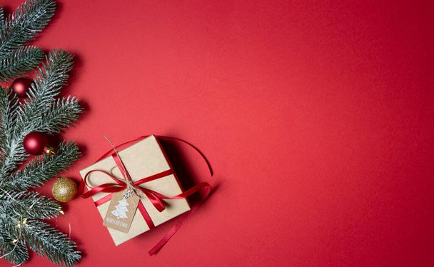 christmas gift box on the red background - Fotó, kép