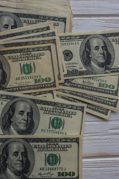 Dollars close-up foto van Amerikaanse Dollar bankbiljetten. Abstracte achtergrond. Macro-injectie. - Foto, afbeelding