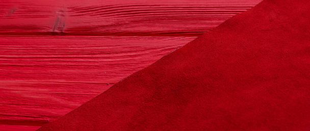 Red matte background of suede fabric, closeup. Wood red plank background. Felt material - Photo, Image