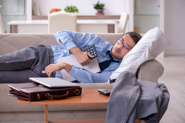 Tired businessman employee working from home - Foto, imagen