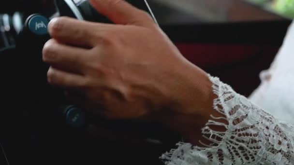 Close-up of female hands on steering wheel while driving a car. Transportation Concept. - Footage, Video