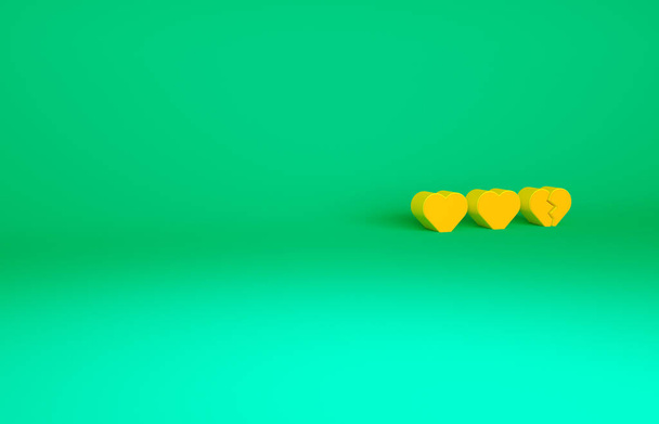 Orangefarbene Herzen für das Spielsymbol auf grünem Hintergrund. Minimalismus-Konzept. 3D Illustration 3D Renderer. - Foto, Bild