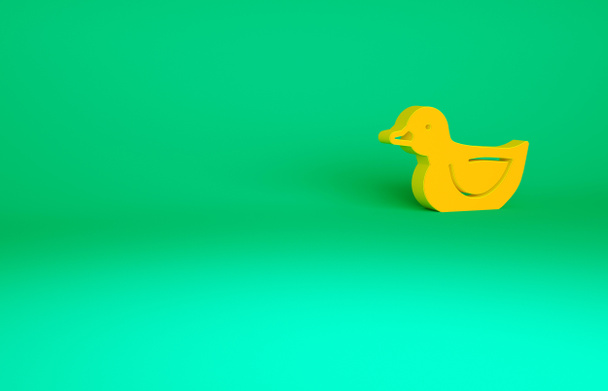 Icône canard en caoutchouc orange isolée sur fond vert. Concept de minimalisme. Illustration 3D rendu 3D. - Photo, image