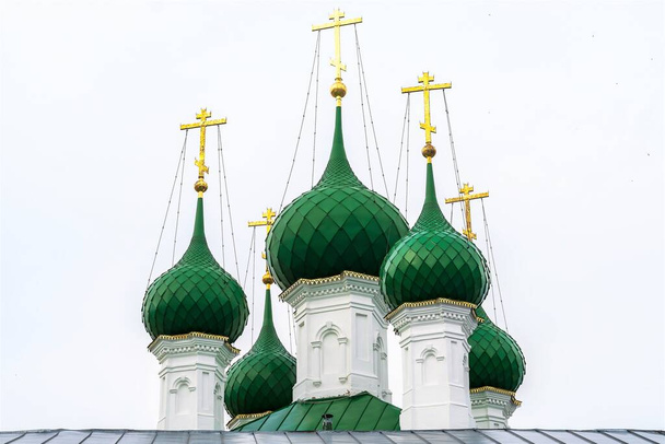 Russia, Kostroma, July 2020. Green domes of an Orthodox cathedral on a white background. - Photo, Image