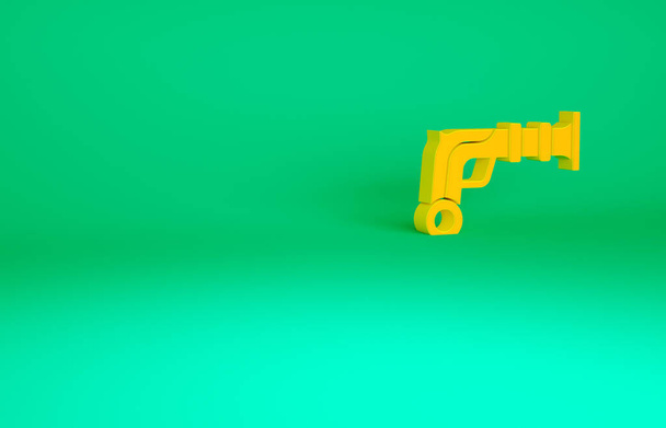 Orange Vintage Pistolen Ikone isoliert auf grünem Hintergrund. Antike Waffe. Minimalismus-Konzept. 3D Illustration 3D Renderer. - Foto, Bild