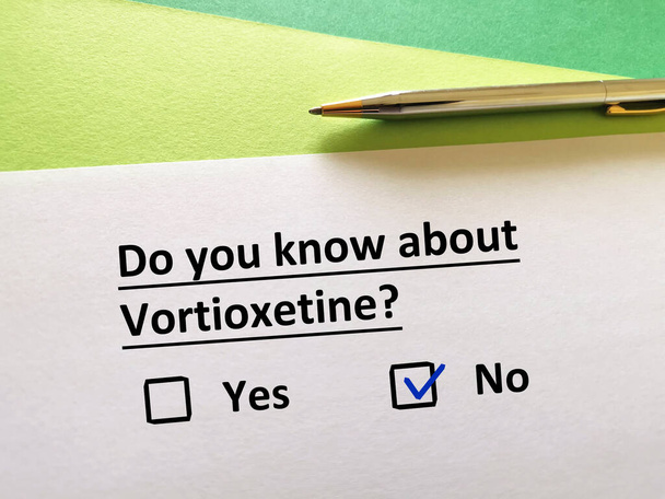 One person is answering question about psychiatric medication. The person does not know about vortioxetine - Photo, Image