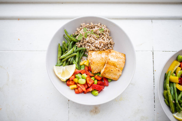 Salmon and buckwheat dish with green beans and tomato - Photo, Image