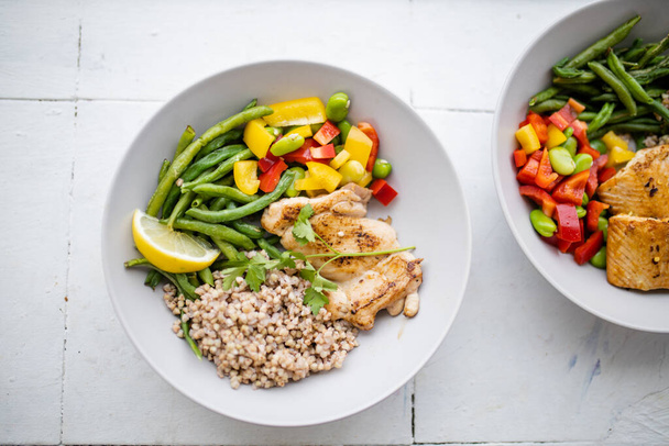 Chicken and buckwheat dish with green beans and bell pepper - Photo, Image