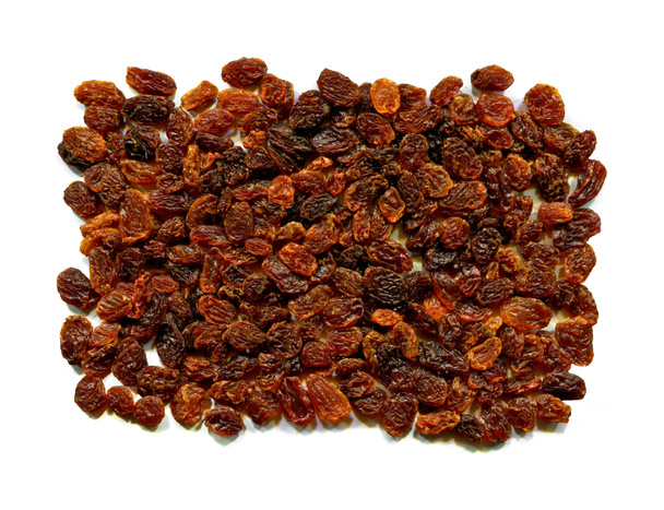 Grains de raisins secs biologiques et sains, isolés sur fond blanc - Photo, image