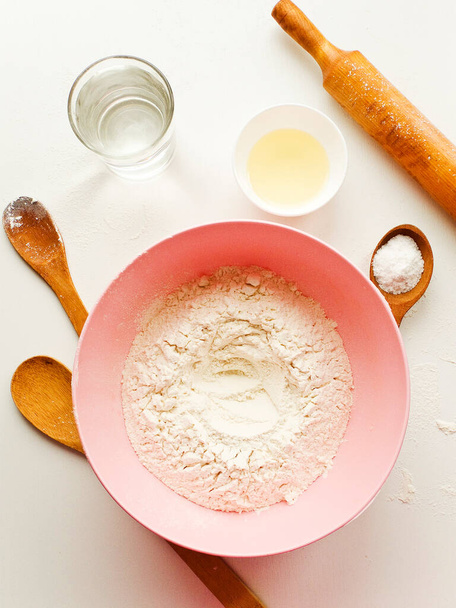 Dough kneading set of ingredients, preparation for baking. Shallow dof. - Foto, Imagem
