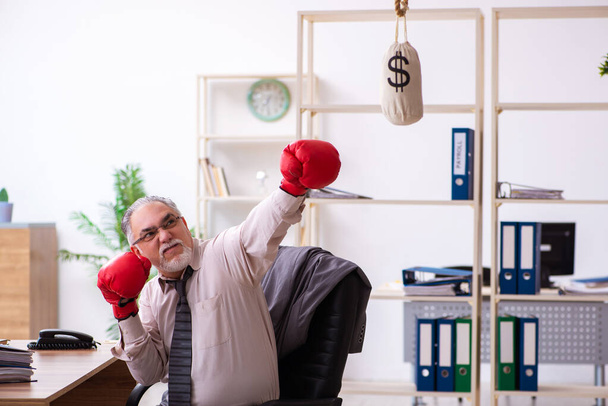 Businessman angry and furious at the workplace - Photo, Image