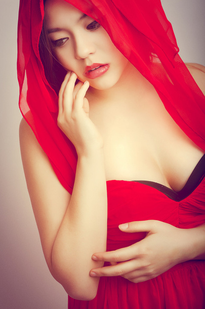asian girl in red clothes - Foto, imagen