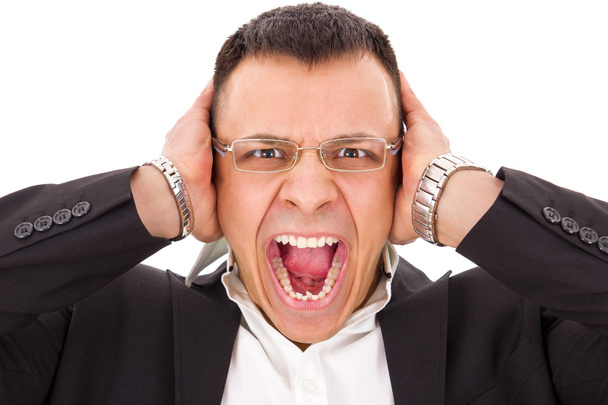 stressed man screaming holding his head - Photo, image