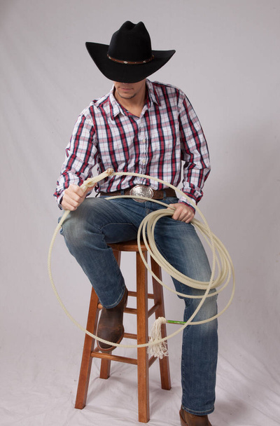Cowboy descansando com um laço - Foto, Imagem