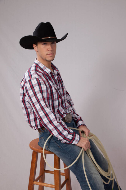 Cowboy resting with a lasso - Foto, Imagen