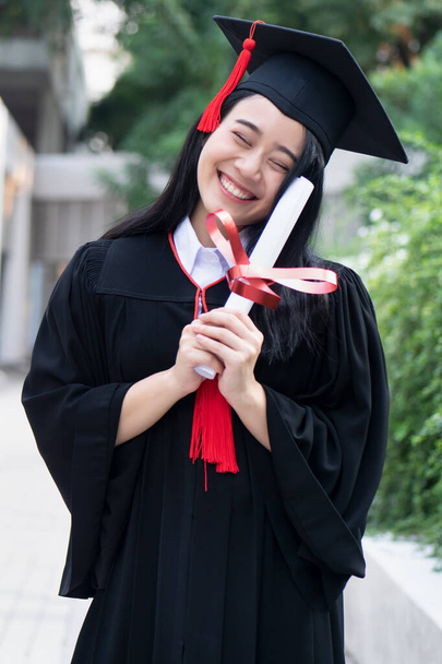 happy excited college student graduating; concept of successful education, happy commencement day, woman education equality, employment opportunity, high education degree, overseas study scholarships - Photo, Image