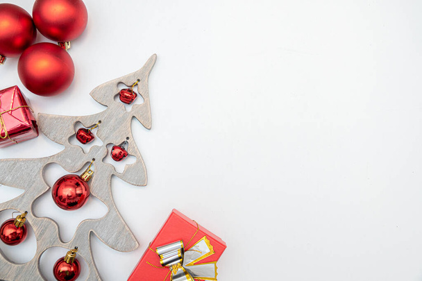 christmas gift with gold balls bow isolated on white - Valokuva, kuva