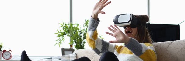 Girl having fun at home with virtual glasses - Foto, Bild