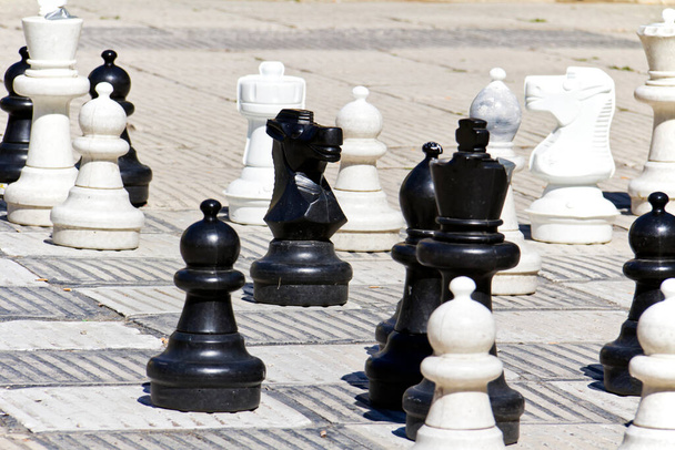 Outdoor chess board with big plastic pieces - Photo, Image