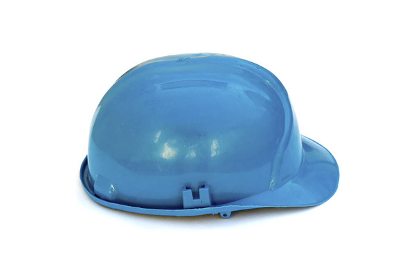 Plastic blue safety helmet over white background. - Photo, Image