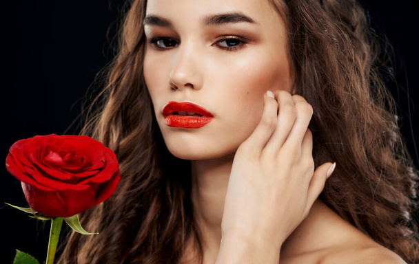 beautiful woman face cosmetics rose in hands romance close-up - Foto, Imagem