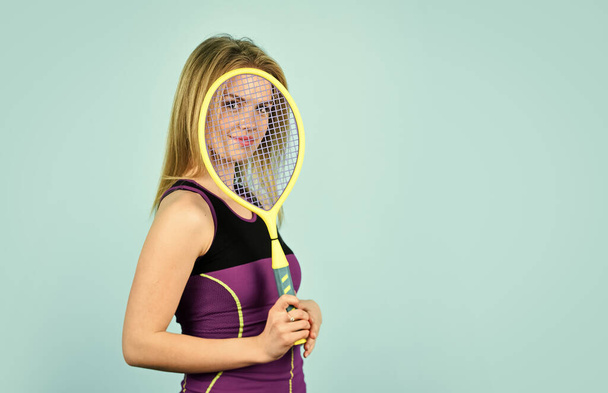 Woman Playing Tennis game. Challenge and concentration in competition. female athlete plays tennis on a professional court. Squash tennis racquet sports. smiling woman training. copy space - Foto, Imagen