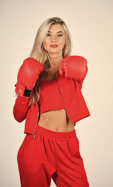 Sport and sportswear fashion. girl in boxing gloves punching. training with coach. fight for success. knockout and energy. Sport success. Boxer girl workout, healthy fitness - 写真・画像