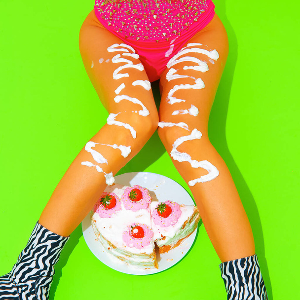 Fashion Girl 90s Party style with yummy crush cake. Holiday, emotions, night club life. Food sweety creative concept. - Zdjęcie, obraz