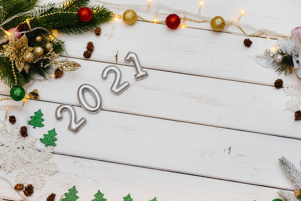 White Christmas background decorated with festive decor, lanterns, snowflakes and Christmas tree branches. Christmas greeting card. Winter holiday season. Happy New Year - Valokuva, kuva