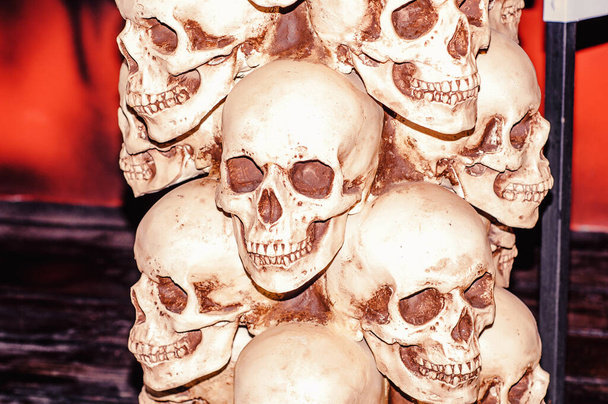 Skull-decorated column in an amusement park - Photo, Image