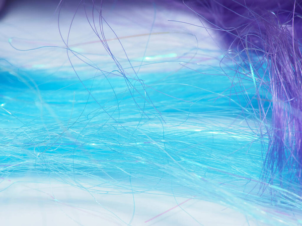 Macro shoot of blue hair on a white isolated background - Fotó, kép