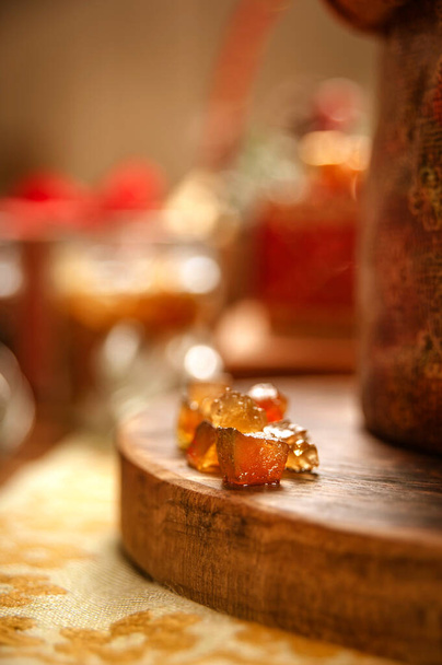 Candied fruit cubes on the wood cutting board - Foto, Imagem