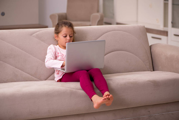 Small girl in tele-education concept at home - Foto, immagini