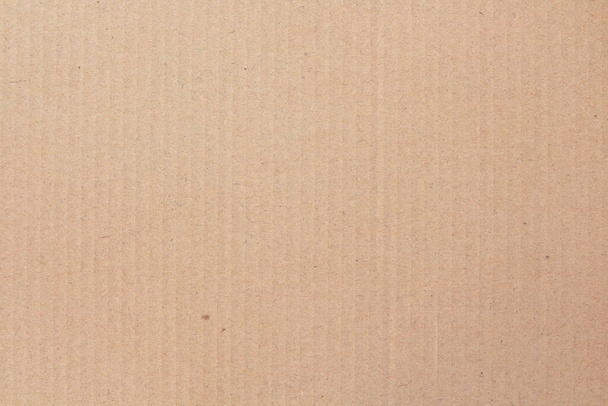 Fondo de textura de hoja de cartón, detalle de reciclar patrón de caja de papel marrón. - Foto, Imagen
